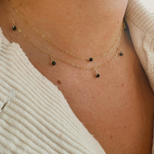 gold choker necklace with dainty black spinel gemstone