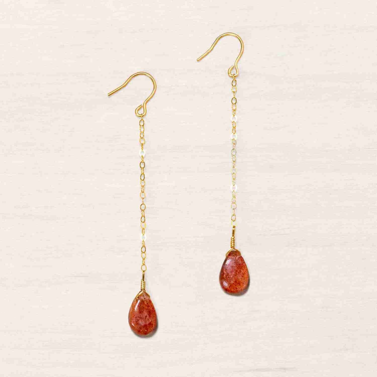 sunstone dangly gold earrings