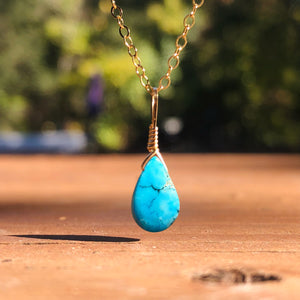 gold wire wrapped turquoise pendant