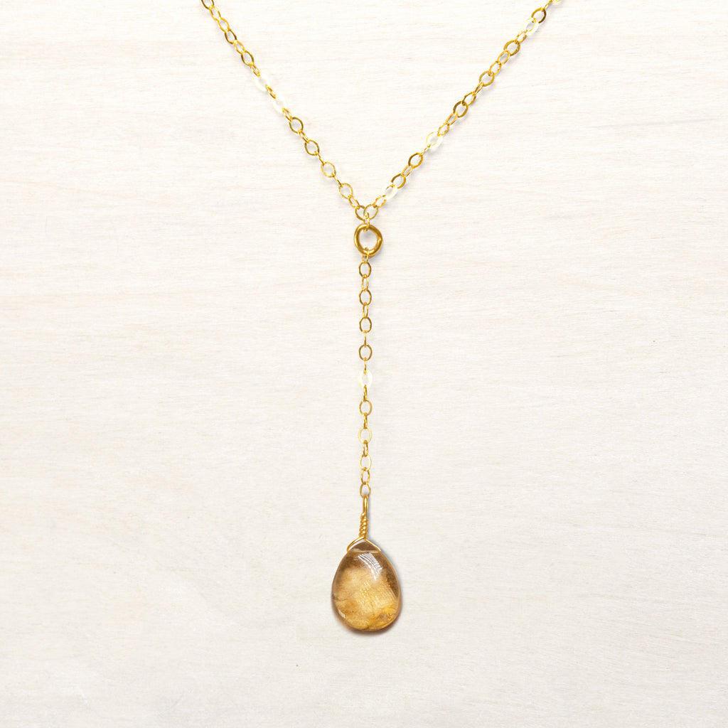 simple citrine gemstone pendant meaning