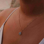 simple gold necklace chain with aquamarine gemstone