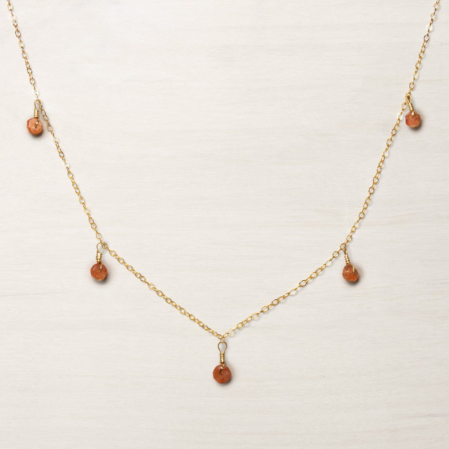 multi-gemstone necklace with sunstone in gold