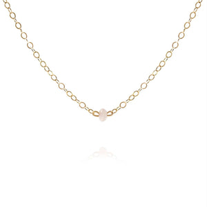gold choker necklace with dainty rose quartz gemstone